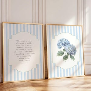 May include: Two framed art prints. One features text from Philippians 4:8, the other a watercolor of blue hydrangeas. Both have a gold frame and a light blue and white striped background.