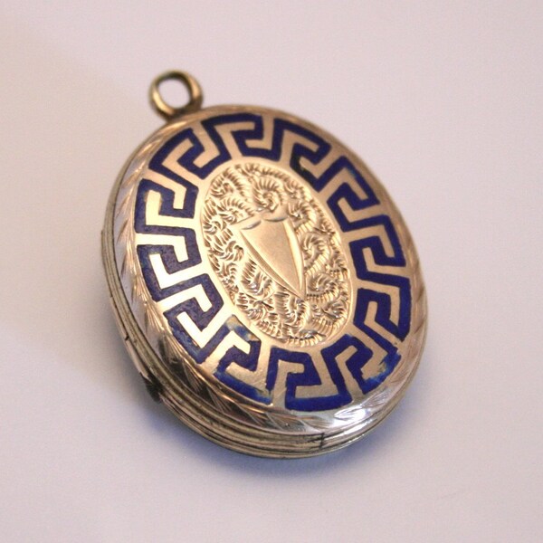 Vintage Victorian gold filled or pinchbeck and blue enamel locket. Mourning.