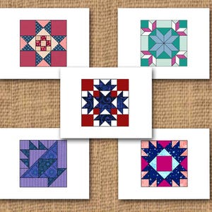 May include: Five printable cards featuring different quilt block patterns. Each card has a white background and features a colorful quilt block pattern with a star in the center. The quilt blocks are made up of various geometric shapes and colors, including red, blue, pink, green, and white.