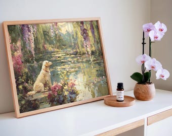 May include: A framed art print featuring a golden retriever dog sitting by a pond, surrounded by colorful flowers and foliage. The artwork has a light brown wooden frame. A small bottle and a wooden tray are on a white surface.