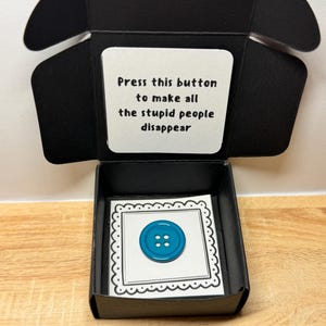 Pocket hug gift box - stupid button
