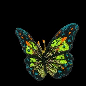 Blacklight reflective butterfly patch