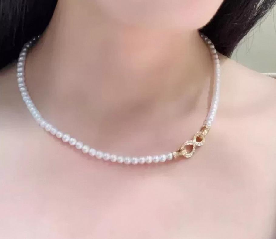 Collana Girocollo di Perle chiusura 3 Cuori in Oro Bianco
