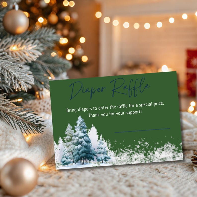May include: A green card with the words "Diaper Raffle" in a script font. The card includes the text "Bring diapers to enter the raffle for a special prize. Thank you for your support!" and a winter forest scene.