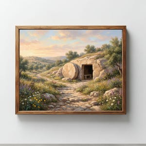 May include: A framed landscape painting depicts a stone path leading to a cave entrance with a large, round stone. The scene is set in a field with wildflowers, trees, and rolling hills under a sunset sky. The frame is made of wood.