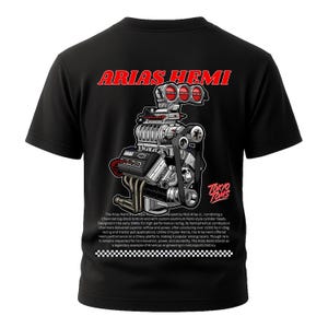 May include: Black t-shirt featuring a detailed graphic of an Arias Hemi engine, with the text "ARIAS HEMI" in red. The design includes the "TOKYO TOMS" logo and technical text. A checkered pattern is at the bottom.
