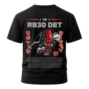 May include: Black t-shirt with a graphic of a red and black RB30 DET engine, Japanese text, and "Tokyo Toms." The shirt also includes the text "Nissan's RB30DET is a legendary 3.0L straight-six engine..."