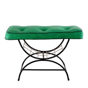 May include: A green upholstered bench with a black metal frame and a wire shelf underneath.