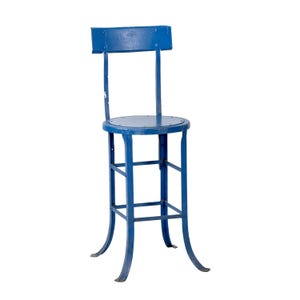 May include: A vintage blue metal chair with a round seat and a small backrest. The chair has a sturdy frame with curved legs and a square footrest. The chair is approximately 36 inches tall.