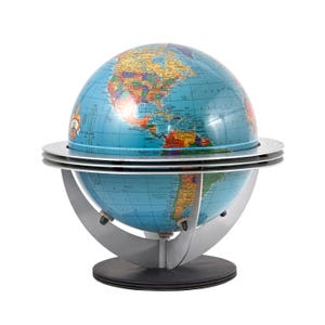 May include: A detailed, blue and multi-colored globe with a silver metal stand. The globe features a detailed map of the world, with continents and countries in various colors. The stand has a circular base and a curved, modern design.