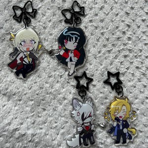 Matching zzz zenless zone zero hugo lycaon evyn astra epoxy keychains