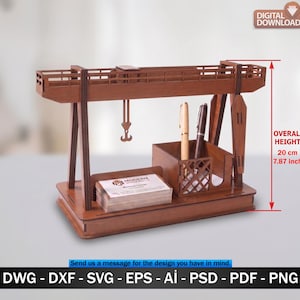 May include: A wooden desk organizer with a crane design. It features a business card holder, pen slots, and a small hook. The overall height is 7.87 inches. The text "DIGITAL DOWNLOAD" is in the upper right corner.