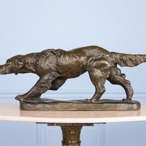 D’après CARTIER Théodore François (1879-1943)  setter irlandais en chasse