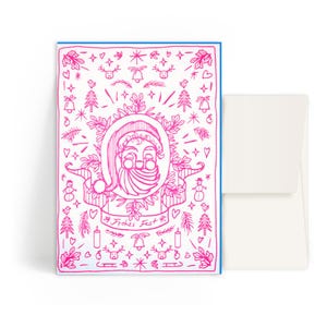 Könnte beinhalten: Eine rosa-weiße Weihnachtskarte mit blauem Rand. Die Karte zeigt eine Illustration des Weihnachtsmanns, umgeben von festlichen Kritzeleien, darunter Rentiere, Glocken und Bäume. Die Worte "Frohes Fest" stehen auf einem Banner. Ein weißer Umschlag ist enthalten.