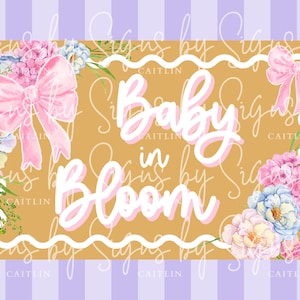 May include: A rectangular design with the words "Baby in Bloom" in white and pink script, surrounded by floral arrangements and pink bows. The background is a mustard yellow color with a purple and white striped border.
