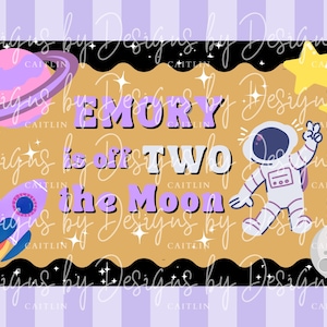 May include: A whimsical design featuring the text "EMORY is off TWO the Moon" with an astronaut, rocket, planet, stars, and moon illustrations. The design is set against a gold and black background with a purple and white striped border.