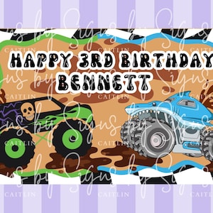 May include: A birthday-themed graphic with a light purple striped border. The design features two monster trucks, one green with a skull and the other blue and shark-shaped, with the text "HAPPY 3RD BIRTHDAY BENNETT".