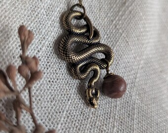 Brass snake necklace// Simple Golden Pendant on an Antiqued Brass Chain// snake necklace//Cosmic snake totem// The Indigo necklace