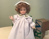 Small Porcelain Doll Curly Blonde Hair White Nightgown Bloomers Jointed Painted Face 6 inches 1990 39 s Vintage