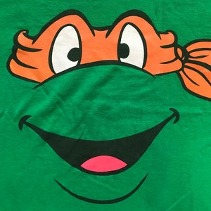 TMNT Michelangelo Face Tee Shirt Green Cotton Orange Mask Graphic Teenage Mutant Ninja Turtles Vintage 2000s T Shirt Adult M Size