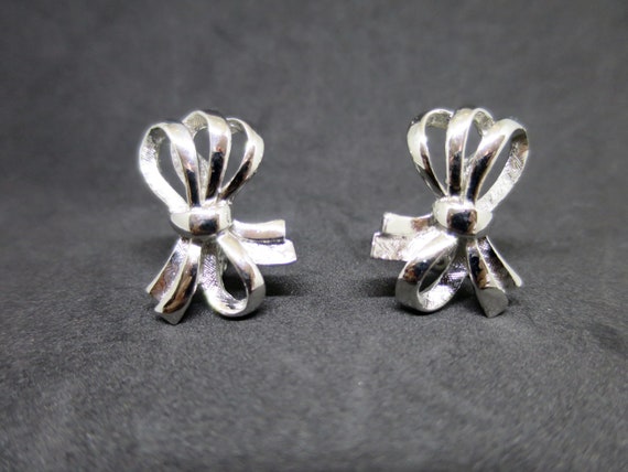 Monet Silver Bow Earrings Triple Tied Bows Vertic… - image 1