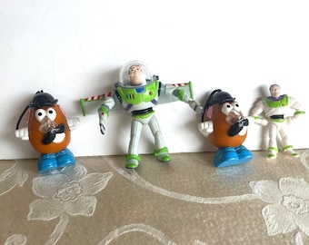 4 Toy Story Figures, 2 Buzz Lightyear, 2 Mr Potato Heads Vintage 1990s Collectible Toys