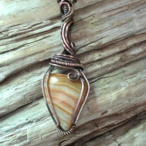 Crazy Lace Agate Copper Pendant Necklace: Antiqued Wire Wrapped Stone