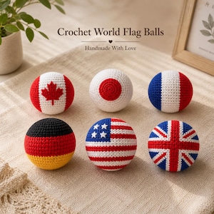 May include: A collection of crocheted balls, each representing a different national flag, including Canada, Japan, France, Germany, the USA, and the UK. The text "Crochet World Flag Balls" and "Handmade With Love" are displayed above the balls.