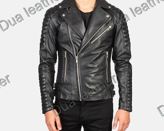 May include: A black leather jacket with a classic biker style. The jacket features a notched collar, asymmetrical zipper closure, and quilted detailing on the shoulders and sleeves. It has multiple zippered pockets and a tailored fit.