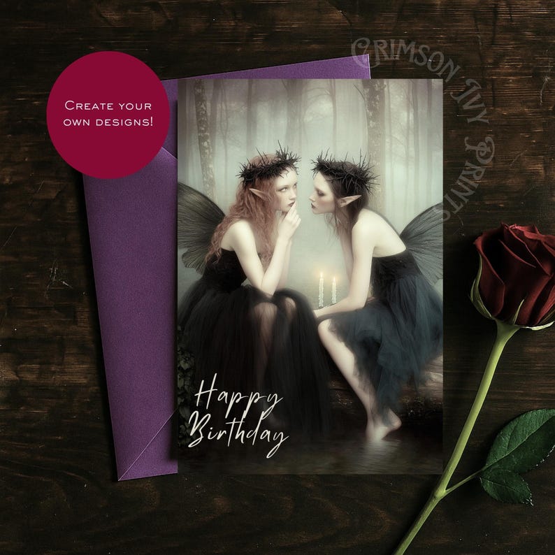 May include: A greeting card with a fantasy illustration of two fairies in black dresses and wings, with the words "Happy Birthday". A red rose and a purple envelope are also visible.