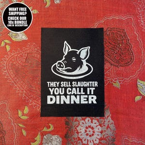 May include: Black rectangular patch featuring a white pig illustration on a plate, with the text "THEY SELL SLAUGHTER YOU CALL IT DINNER". A circular graphic in the top left corner reads "WANT FREE SHIPPING? CHECK OUR 10X BUNDLE LINK IN DESCRIPTION".