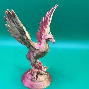 3D-printed phoenix figurine, a majestic bird associated with rebirth, fire, and immortality in mythology and fantasy settings.