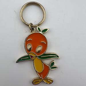 Llavero vintage de Disney con el pájaro naranja