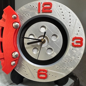 Disc brake wall clock