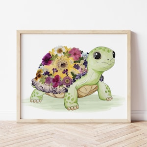 May include: A framed print featuring a whimsical illustration of a green turtle with a shell adorned with colorful flowers. The turtle has a friendly expression and is set against a soft green background, creating a cheerful and artistic piece.
