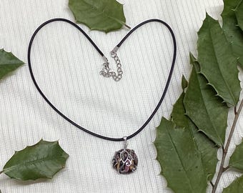 sterling silver clad round holly gem