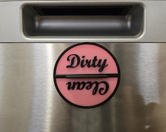 A magnetic dishwasher sign showing clean and dirty