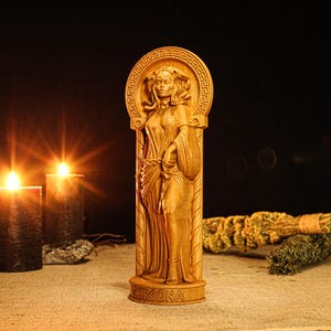 Greek goddess figure