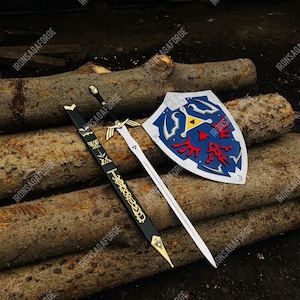 May include: A sword, scabbard, and shield set. The sword has a silver blade and black handle. The scabbard is black with gold accents. The shield is blue with red and yellow details. The text "IRONSAGAFORGE" is visible.