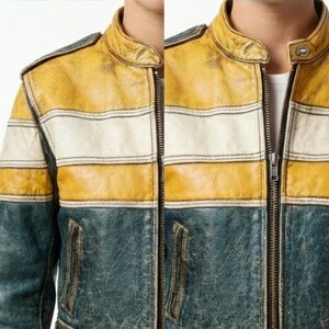 Op de afbeelding: Een leren jas met een color-block ontwerp met horizontale strepen in mosterdgeel, wit en donkerblauwgroen. De jas heeft een opstaande kraag, een metalen ritssluiting over de hele lengte en zichtbare verticale stiksels op de voorpanden.