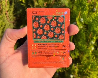 Carta estilo Pokémon Feid FERXXOCALIPSIS