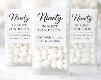 May include: Three clear plastic containers filled with white mints. Each container has a white label with the words "Ninety IN MINT CONDITION" and "Carl's 90th Birthday - October 16, 2026."