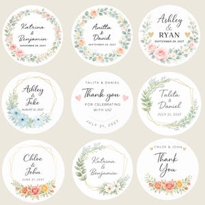May include: Nine circular stickers with floral and geometric designs. Each sticker features names and dates, with pastel-coloured floral arrangements. Some stickers say "Thank you" with hearts.