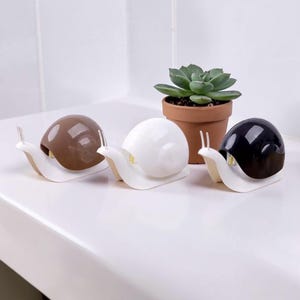 Dispensador de sabonete em formato de caracol fofo - Bomba de loção de plástico durável e de alta qualidade - Decoração minimalista e exclusiva para banheiro - Ideia criativa para presente de boas-vindas