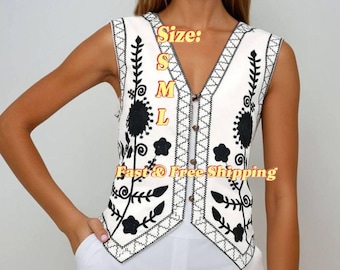 Chaleco bohemio con bordado floral: top blanco sin mangas con cuello en V, regalo étnico para festivales, prenda vintage con capas, estilo chic.