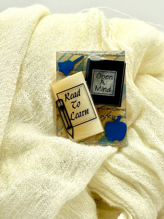 Lucinda signed limited edition "Read To Learn" book-themed collectible brooch. View 2