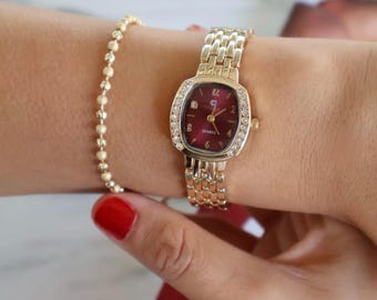 Reloj de lujo para mujer en oro y plata / Bisel de cristal / Elegante reloj de cuarzo con brazalete