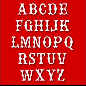 May include: A complete set of uppercase English alphabet letters from A to Z displayed in a white, decorative, serif-style font with a subtle drop shadow, arranged in five rows against a solid, vibrant red background.