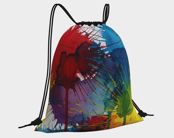 May include: A drawstring backpack with a vibrant watercolor design. The bag features a colorful splatter pattern in shades of red, blue, yellow, green, and purple. Black drawstrings and a black top complete the design. The bag is suitable for carrying various items.