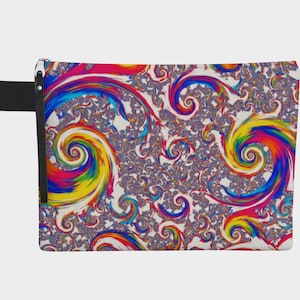 May include: A rectangular cosmetic bag featuring a colourful, swirling design in red, yellow, blue, and purple. It has a black handle and zip pull. The background is a light cream colour.